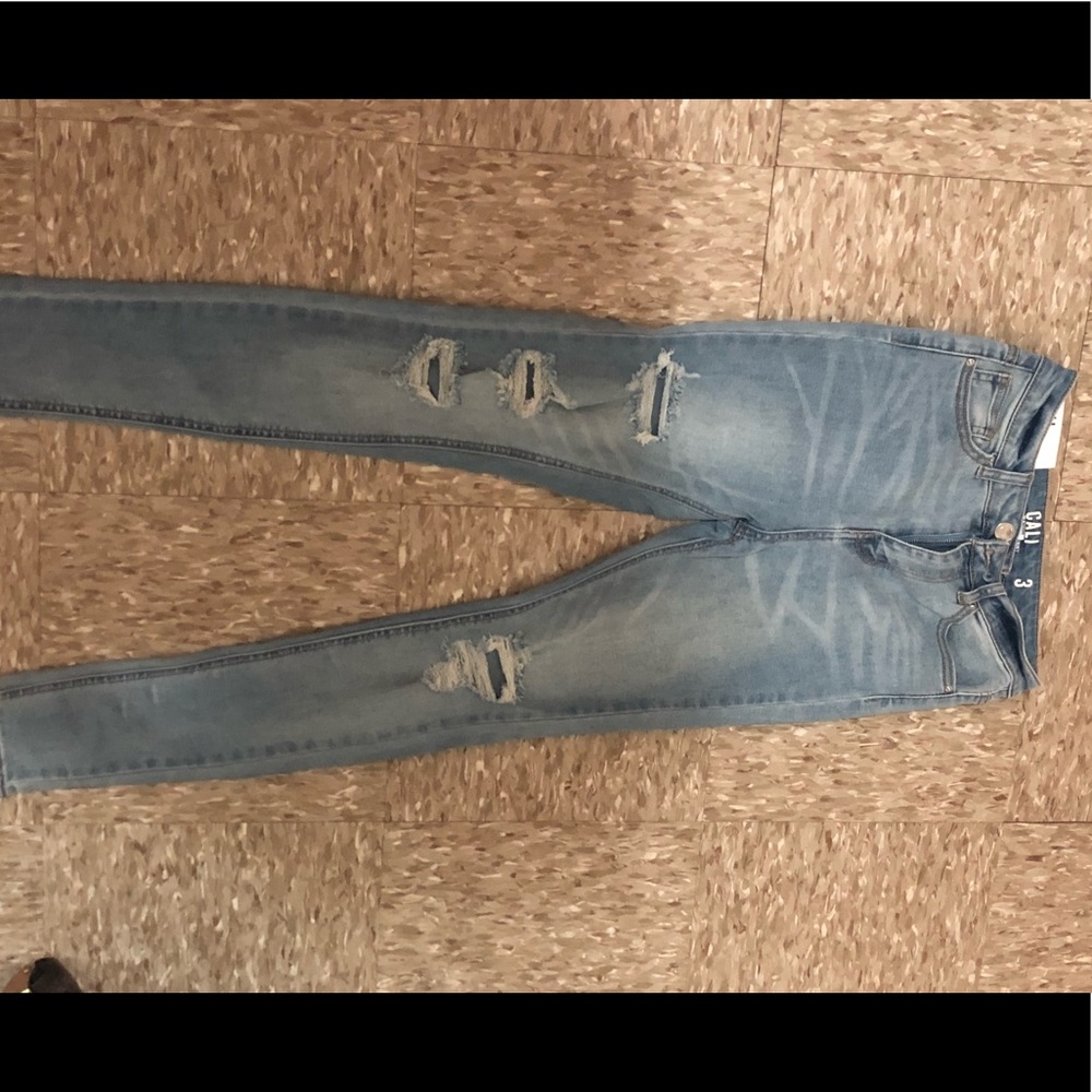 Size 3 high rise skinny Jeans distressed